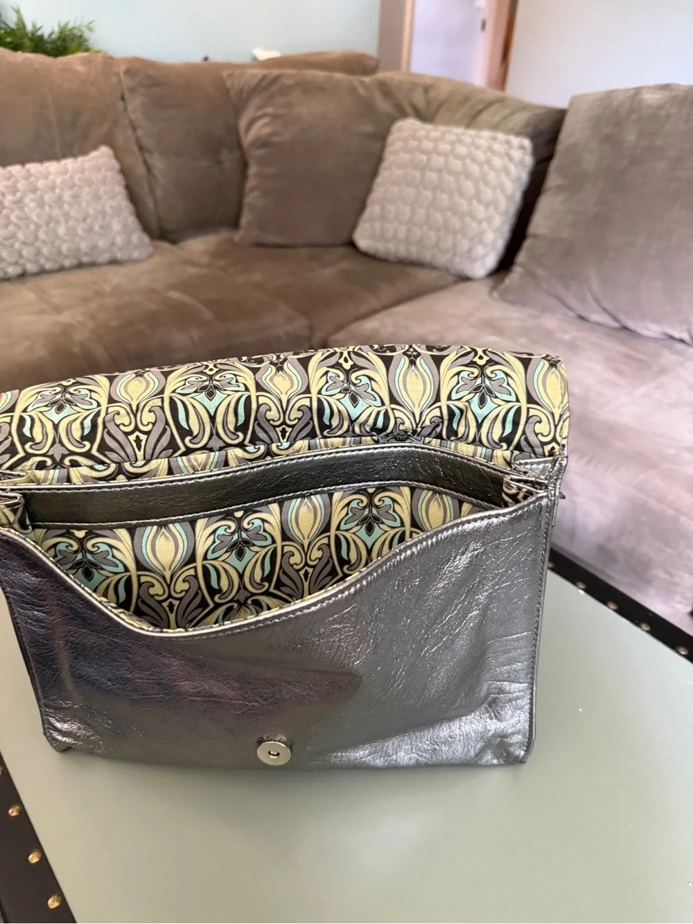 mark. Metallic Silver Fold-Over Clutch with Dark Accent Clasp